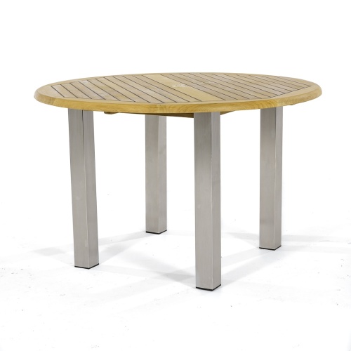 70739  Vogue Laguna 4 foot Round Dining Set of Vogue 4 ft Round Teak and Stainless Steel Table with 4 Laguna Teak Side Chairs top angled on white background