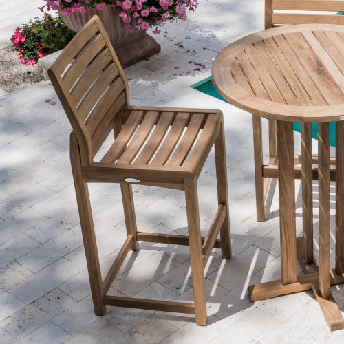 11812 Somerset Side Barstool on concrete patio overhead view next to potted flowering plant