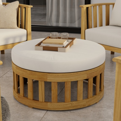 14171DP Kafelonia 36 inch Ottoman-Coffee Table on concrete patio in front of a pool overlooking the ocean in background
