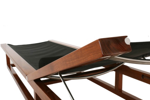  16771 Maya Chaise Lounger in black Textilene mesh fabric and bolster cushion in our marine gloss finish close up view of back rest teak frame on a white background 