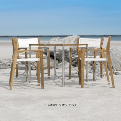 70459 Odyssey 5 Piece folding teak and stainless steel dining set of Odyssey 32 inch square dining table and 4 Odyssey folding chairs folded flat for storage on white background