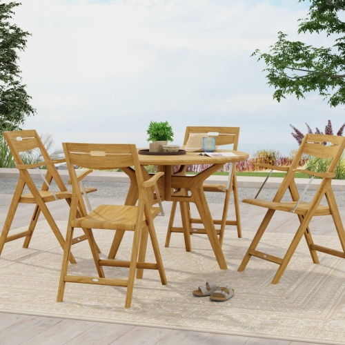 70804 Surf Marine Grade 42 inch round Folding Dining Set with 4 chairs folded leaning up against table on white background