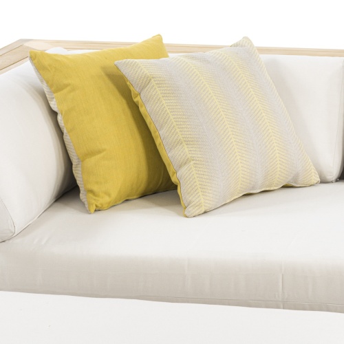 71005ccpg citrus glow throw pillow showing two on sectional sofa on white background