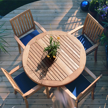  12196ST Sussex Dining Chair showing with 5 piece Sussex Teak Dining Set overhead view on wooden deck