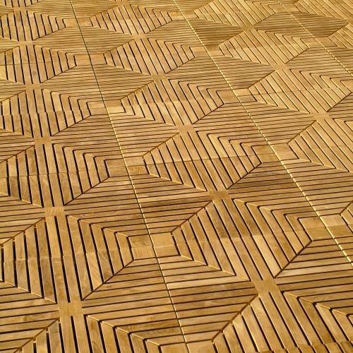 70413 diamond teak tiles fifty cartons covering five hundred thirty five square feet assembled together on floor