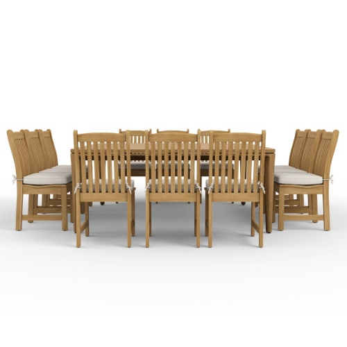 70879 Veranda 13 piece teak Square Dining Set of 12 teak side chair and 6 foot square dining table on wood deck with 4 lamp posts palm trees landscape plants and shrubs in background