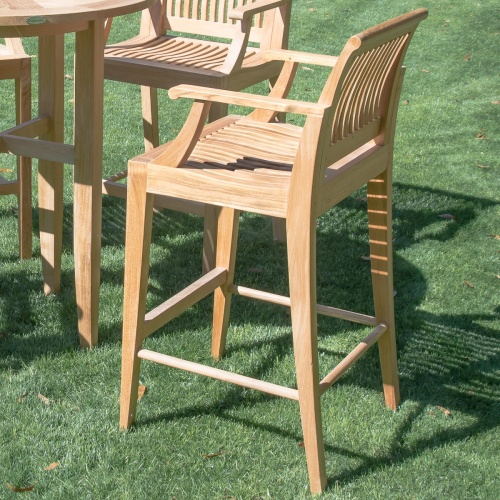 12910 Laguna Teak Bar Stool left side on grass field