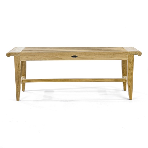 13915 Laguna 4 foot long teak Backless Bench on concrete walkway with grass in background