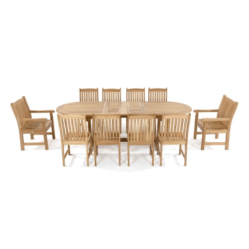 70008 Montserrat Veranda eleven piece oval dining set side view showing seat cushions on a grass field 