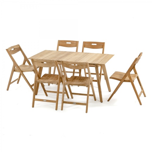 70518 Surf 7 piece teak folding Dining Set on paver patio with landscape plants and shrubs in background in aerial view