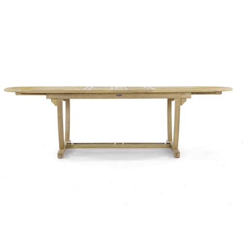 15504 Montserrat teak oval expandable dining table in side profile on white background