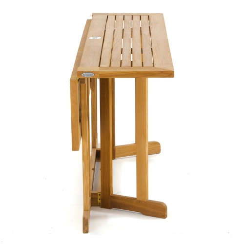 15663S Nevis Drop Leaf Teak Table in angled view end of table with one side down on white background