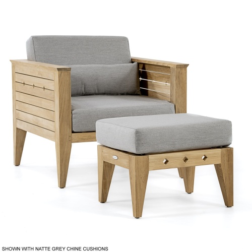12160dp Craftsman teak armchair and ottoman with cushions angled view on white background