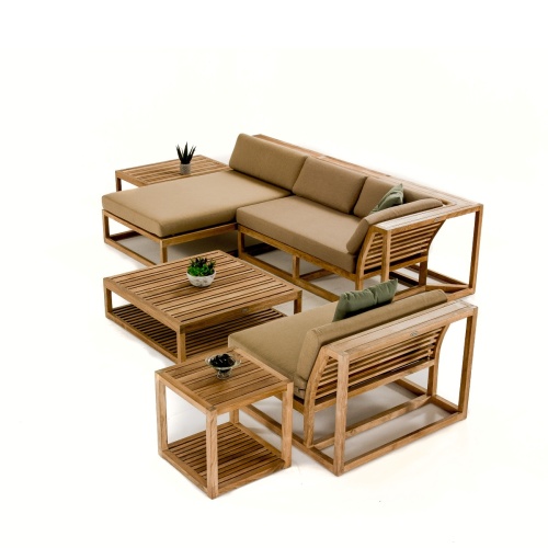 18800DP Maya Ottoman Coffee Table with Maya collection showing cushioned daybed left sofa slipper chair potted succulents on two side tables and ottoman aerial view on white background