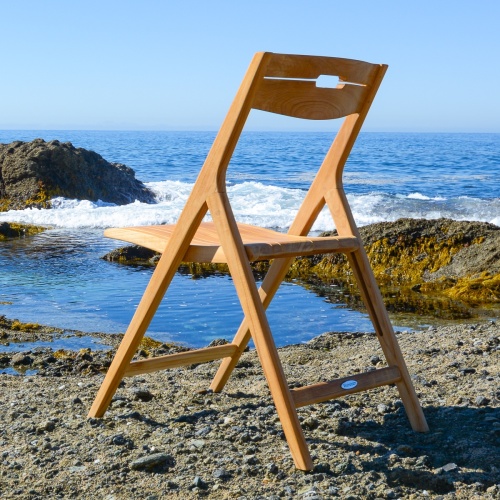 11916 Surf Side Chair on beach facing ocean and blue sky background