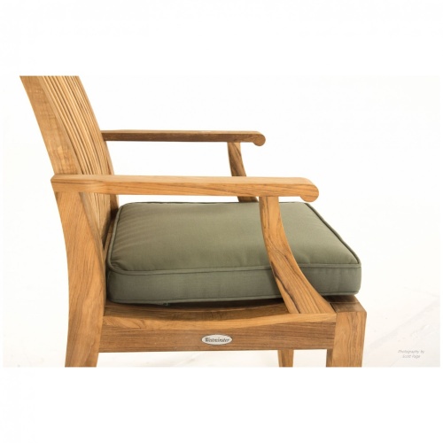 12810 Laguna Teak Dining Armchair  closeup view facing right with optional chair cushion on seat on white background