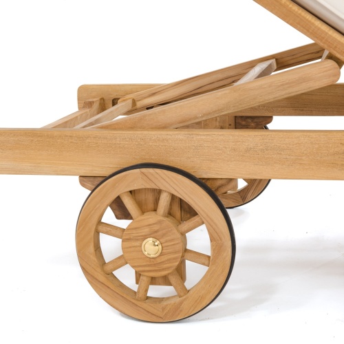 70510 Somerset teak chaise frame closeup view of rubberized wheel and reclining mechanism on white background