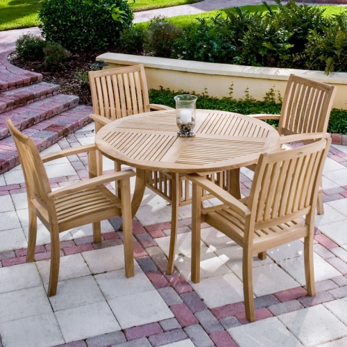 12196 Sussex teak stacking armchair with teak martinique dining table on white background