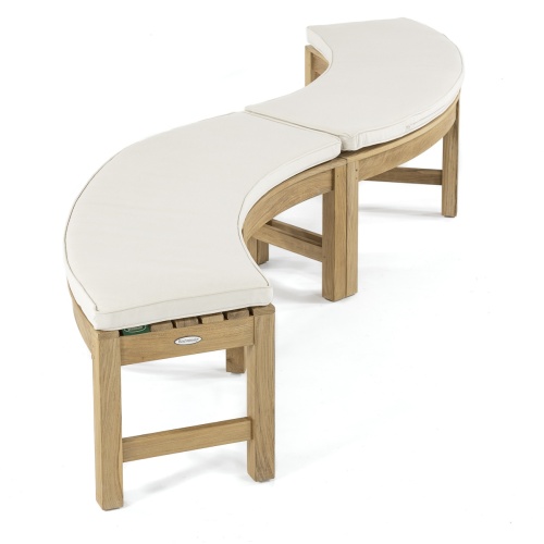 13937 Buckingham teak backless curved bench showing 2 curved benches in S shape angled view on grass with trees in background