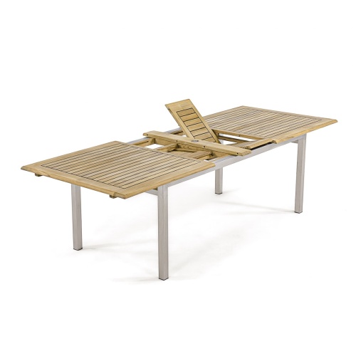 25025 Vogue Teak and Stainless Steel extension Dining Table in angled side view showing table partially extended on white background