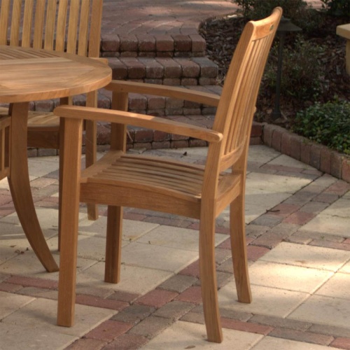 12196 Sussex Teak Chair stacked 4 high in angled front view on white background