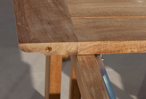 15900 Horizon Rectangular Extension table in angled side view showing  table leaf in storage area on white background