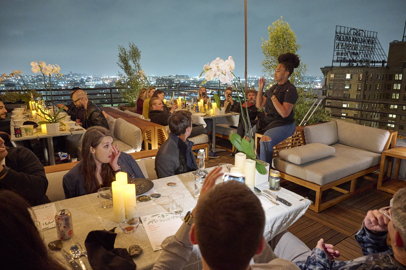 Guest Chef details what she cooked for the night to the patrons of the DTLA Dinner Club