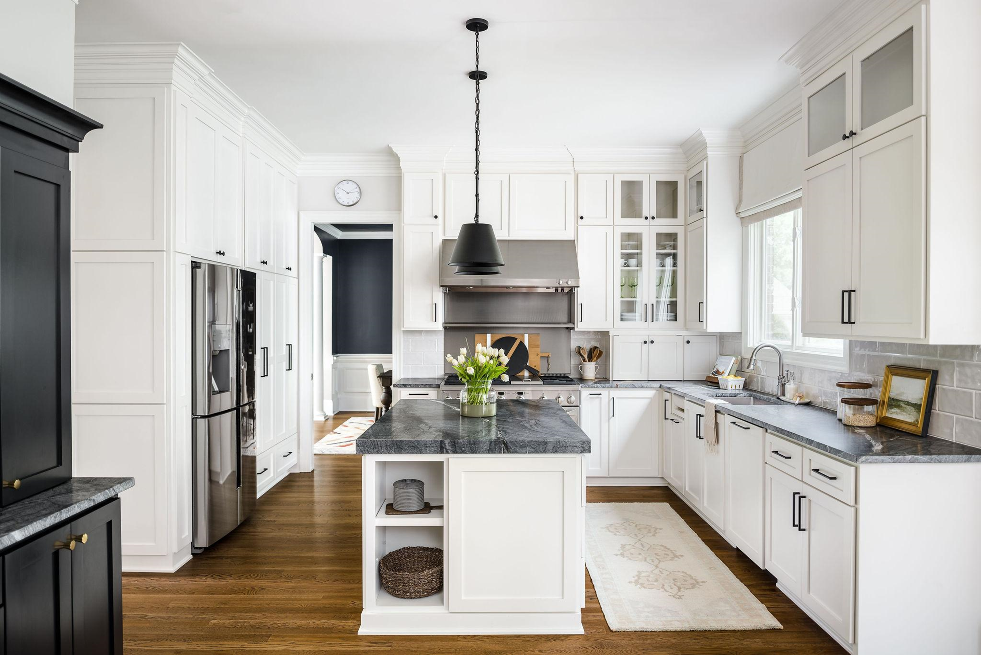 White kitchen with stainless steel appliances